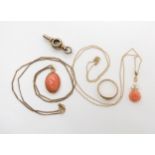 A 14k gold coral and pearl rose pendant on a yellow metal chain, length 1.3gms, a 9ct coral