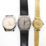 A Ernest Borel, cocktail 'kaleidoscope' ladies watch, an Omega quartz DeVille, and a Russian watch