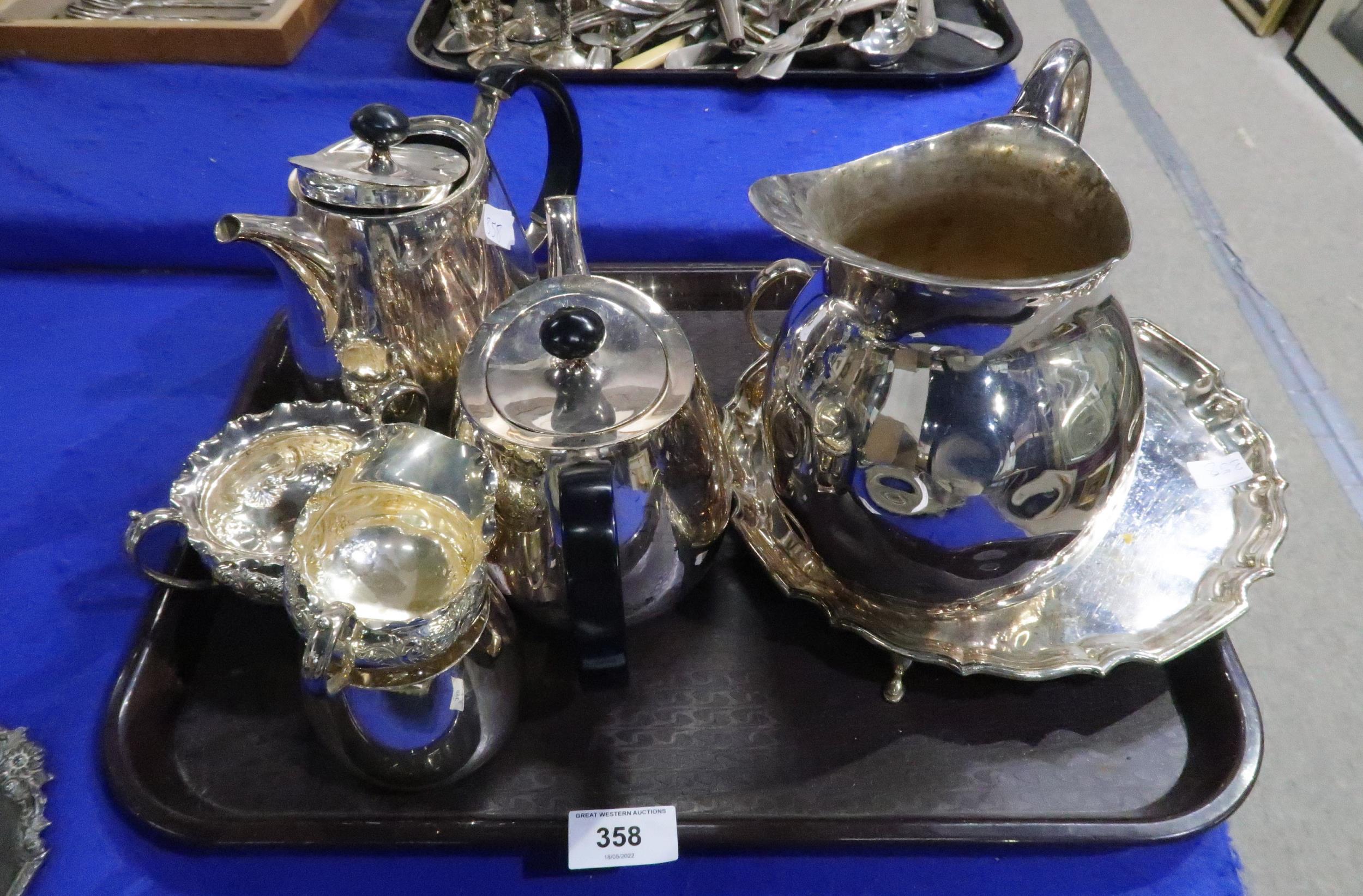 A selection of EPNS including teapots, a pitcher, sugar bowls and cream jugs, an EPNS waiter