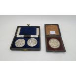 A pair of silver sporting medals, by James Fenton, Birmingham 1949, and a white metal agricultural