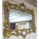 A 20th century gilt metal framed wall mirror, 84cm high x 74cm wide Condition Report:Available