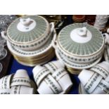 A Spode Provence pattern dinner service comprising two tureens, plates, bowls, soup coupes, cups and