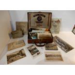 A collection of topographical postcards, photos, cigarette cards etc together with a Pick Brand