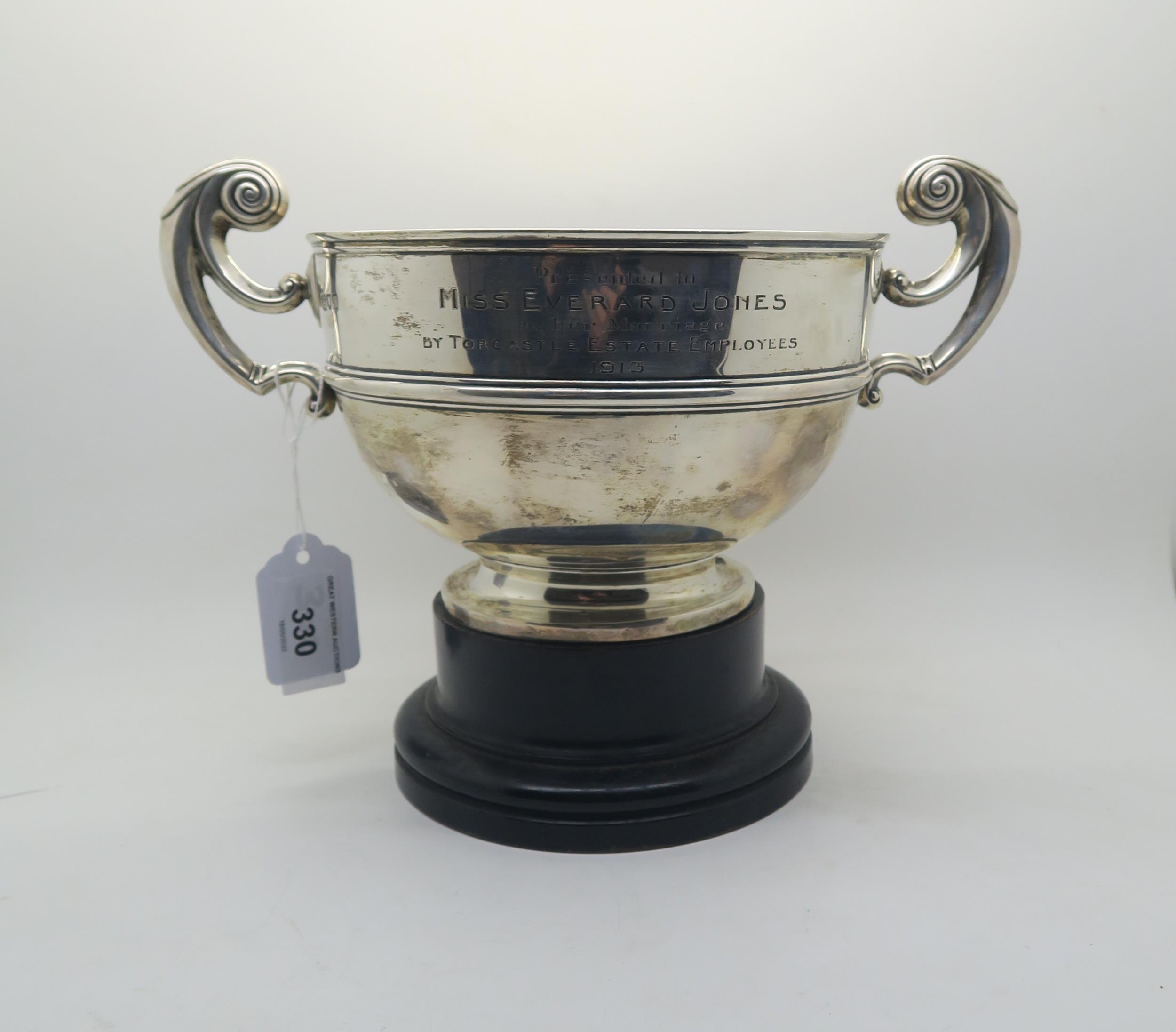 A George V silver trophy cup, engraved 'Presented to Miss Everard Jones on her Marriage by Torcastle