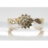 A 9ct gold diamond cluster ring set with estimated approx 0.25cts of diamonds, size M, weight 2.4gms