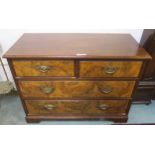 A Victorian mahogany and walnut two over two chest of drawers, 77cm high x 107cm wide x 51cm deep