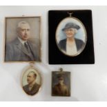 FOUR EARLY 20TH CENTURY MINIATURE PORTRAITS comprising;A lady and gentleman and two officers in