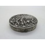 A Continental silver table box, with repousse and chased bacchanalian scenes to the lid, with