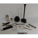 A silver mounted studs box, silver mounted scent bottle, pince nez, various pen knifes etc Condition