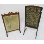 A 20th century mahogany framed tapestry fire screen dated 1937 and another mahogany and silk fire