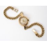 A 9ct gold ladies Tudor wristwatch, weight 17.9gms Condition Report:Winds and is ticking, numbers on
