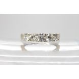 A 14k white gold five stone diamond ring, Illiana for The Jewellery Channel, set with estimated