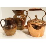A copper kettle, a stoneware hunting jug and another jug Condition Report:Not available for this