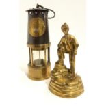 The Protector Lamp & Lighting Co. Ltd Eccles Type SL safety miners lamp, and a brass figure of a