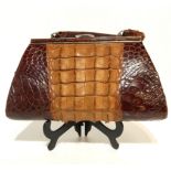 A crocodile skin handbag Condition Report:Available upon request