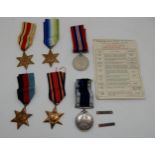 A collection of WW2 British military medals, The 1939-1945 Star, The Africa Star, The Burma Star,