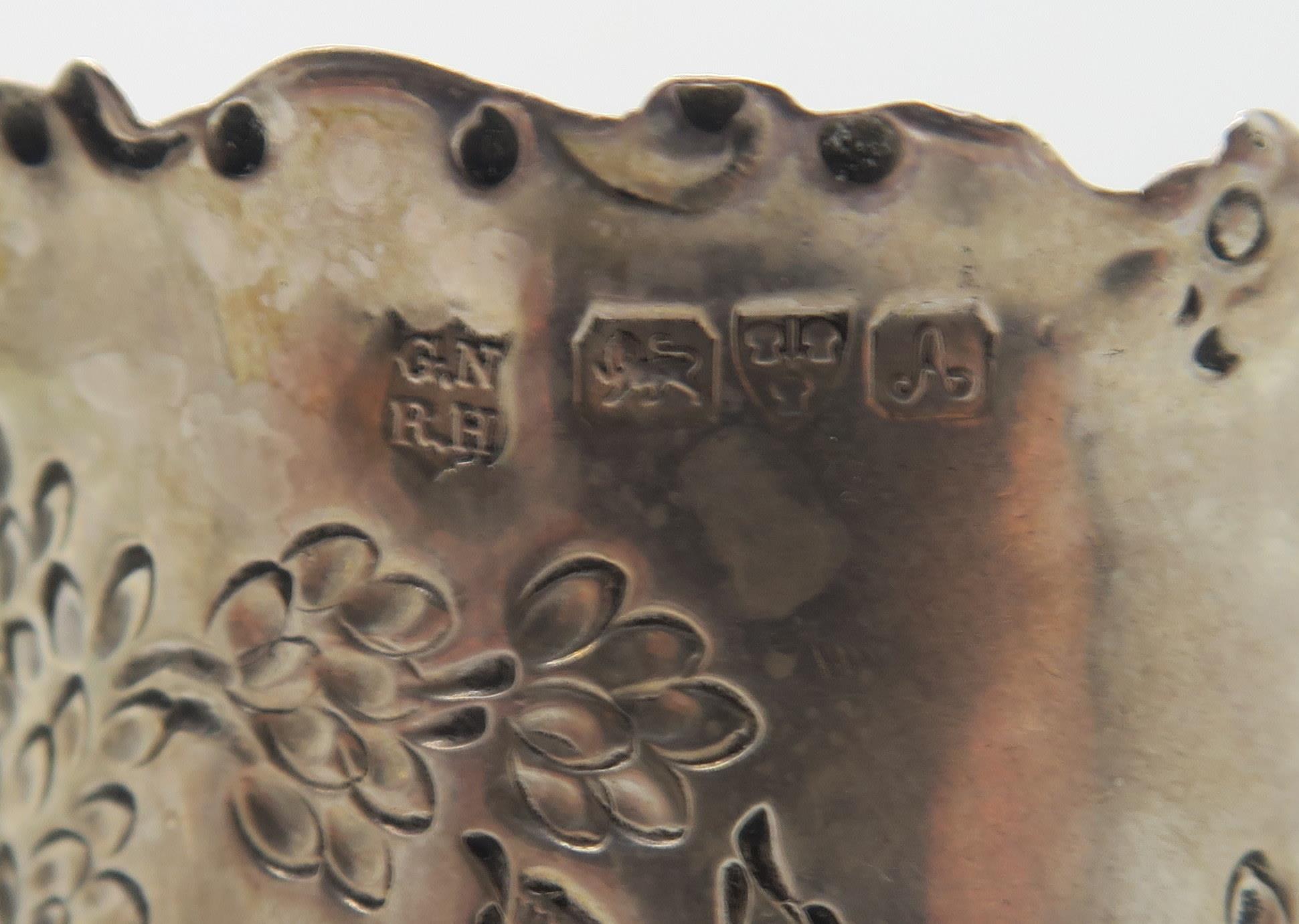 A silver cream jug, with chased and applied decoration of rabbits and birds, with scrolling rim - Image 4 of 6