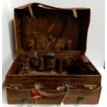 An early twentieth century reptile skin valet travel case and another case Condition Report: