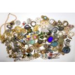 A large collection of vintage brooches to include, a retro Bute ceramic brooch, items by Miracle,