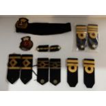 A selection of naval epaulets and badges Condition Report:Available upon request