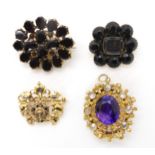 A yellow metal brooch set with rose cut diamonds, 2.5cm x 2.2cm, an amethyst and moonstone