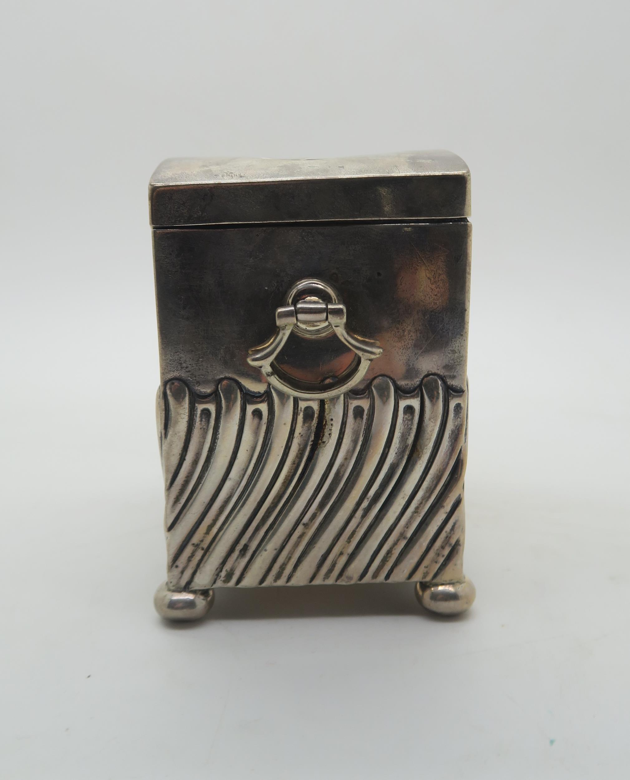 An Edwardian silver tea caddy, modelled as a chest, the body with waved fluted decoration, with - Image 3 of 4