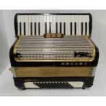 A Hohner Concero 1 accordion , 34 key and 72 bass with case Condition Report:Some of the black