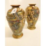 A pair of Satsuma vases with applied decoration of a dragon, by Hakusan, gilt marks to bases