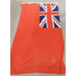 A British Naval Red Ensign flag approximately 2.6m in length Condition Report:Available upon