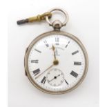 A silver John Forrest open face pocket watch, hallmarked 1904, with key Condition Report:Not