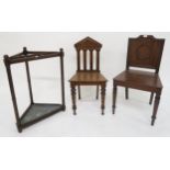 A Victorian mahogany hall chair, a Victorian oak court chair and a 20th century oak corner