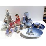 A collection of Royal Copenhagen including vases, two Doulton ladies, and assorted other items