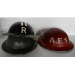 A British WW2 home front Army Fire Service helmet, A Civil Defence helmet and another Condition