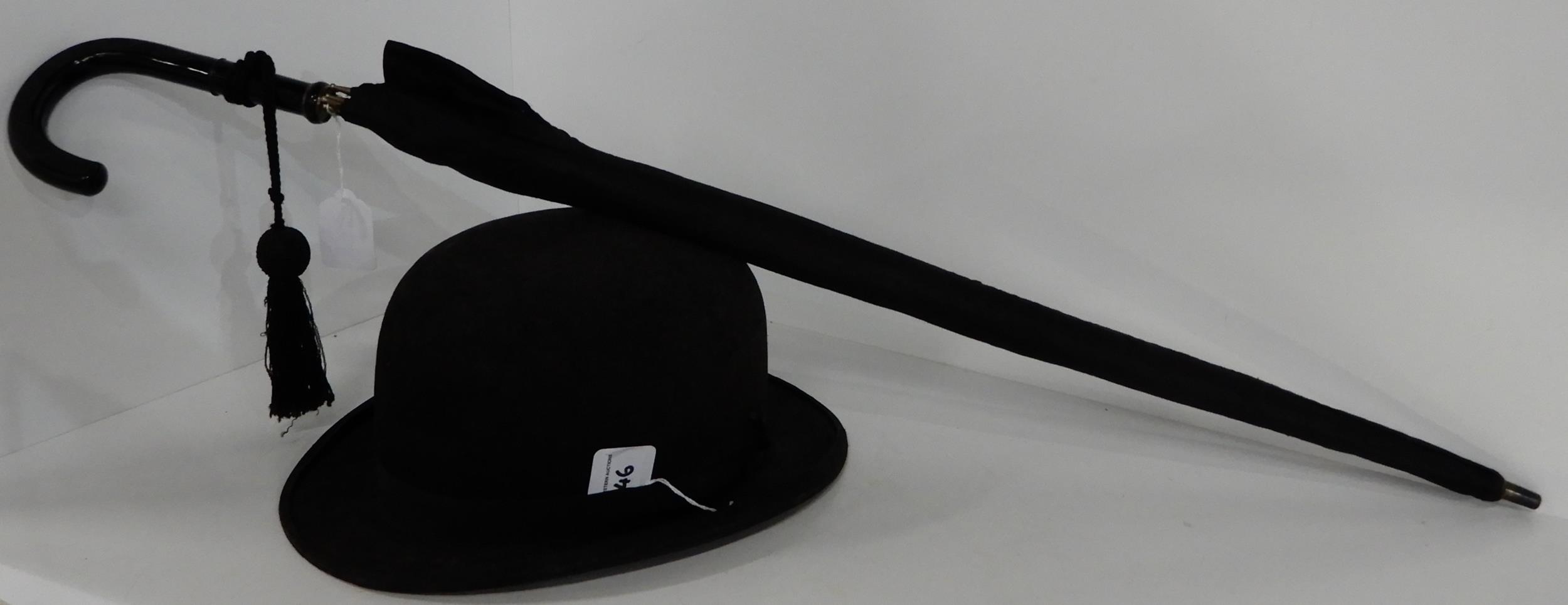 A Woodrow of Piccadilly black bowler hat and an umbrella with ebonised handle Condition Report: