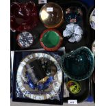 A crystal ball on stand, The Eye of Time watch/compass, assorted glass paperweights, art glass