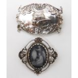 A silver Cherub brooch, and a Wedgwood plaque mourning brooch Condition Report:Not available for