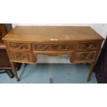 A Victorian mahogany writing desk on square tapering supports, 77cm high x 120cm wide x 55cm deep