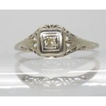 A diamond set white metal American style ring, size L 1/2, 1.1gms Condition Report:Available upon