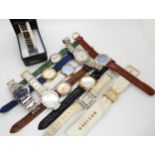 A collection of fashion watches to include Swarovski, Accurist etc Condition Report:Not available