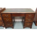 An Edwardian mahogany twin pedestal writing desk, 76cm high x 118cm wide x 57cm deep Condition