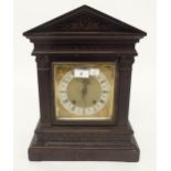 A Victorian mahogany cased mantle clock with silvered and brass face, 43cm high x 32cm wide x 20cm