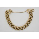 A 9ct chunky curb link bracelet with ring clasp, approx 20cm long, with safety chain, 107.8gms