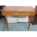 A Victorian mahogany single drawer fold over tea table on square tapering supports, 73cm high x 99cm
