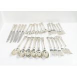 A collection of kings pattern cutlery, comprising six table spoons and five forks by Atkins