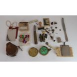 A mixed lot of WW2 related items with signal mirrors, a field compass, a Luftwaffe butter knife,