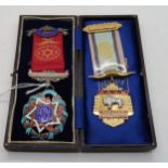 A Birmingham silver and enamel Masonic medal presented to Brother P. Sewell by Royal Albert Lodge an