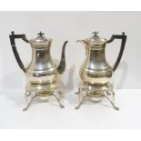 An Edwardian silver tea and hot water set, comprising teapot, hot water pot, with silver warmers