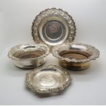An Elizabeth II silver wine coaster, with shellwork rim and turned wooden base, by Mappin & Webb,