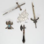 A Malcolm Gray Maeshowe silver pendant, and sword brooch, together with a Iona silver sword