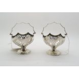 A pair of silver baskets with pierced decoration, by Mappin & Webb Ltd, London 1912, 103gms (2)